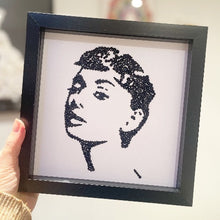 Load image into Gallery viewer, Handmade Audrey Hepburn wall art in a black frame