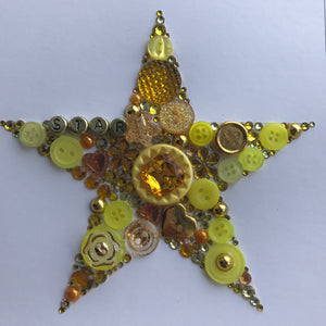 Sparkly star framed button art. Gold