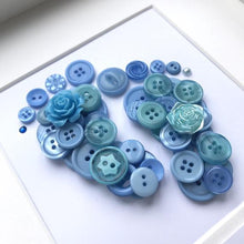 Load image into Gallery viewer, baby boy footprints blue button art framed picture.
