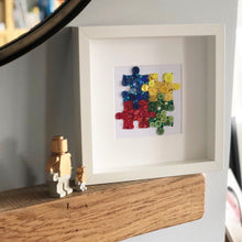 Load image into Gallery viewer, Autism Awareness puzzle piece button art. Framed picture.