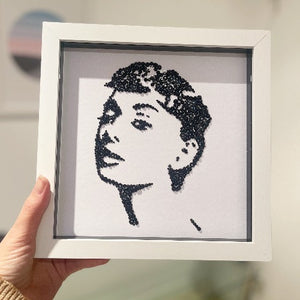 Audrey Hepburn Artwork in a white box frame