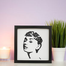 Load image into Gallery viewer, Portrait of Audrey Hepburn in a black frame 