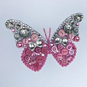 Sparkly butterly button art framed picture.
