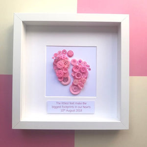 Framed pink button art baby footprints