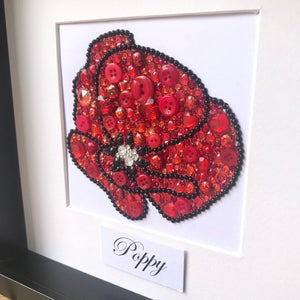 Red sparkly poppy button art framed picture.
