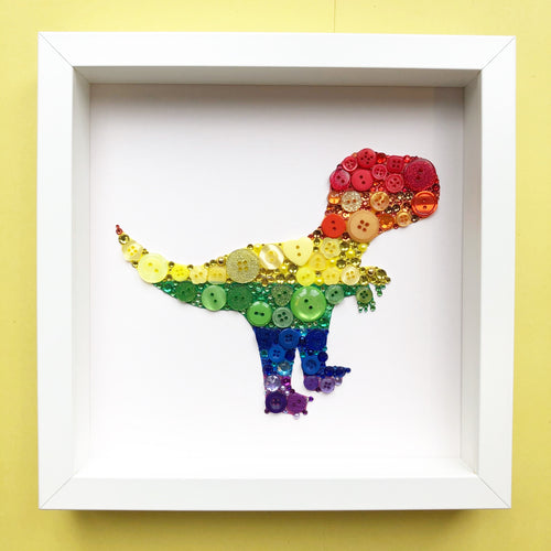 Sparkly rainbow dinosaur button art