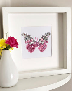 Sparkly butterly button art framed picture.